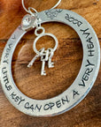 MANTRA ORNAMENT - A LITTLE KEY CAN OPEN A VERY HEAVY DOOR